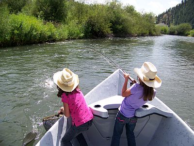 Avery & Ashlyn Land a Trout - Click for an Enlargement